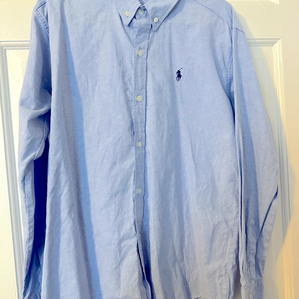 Boys medium long sleeve blue button up shirt. Only worn once.